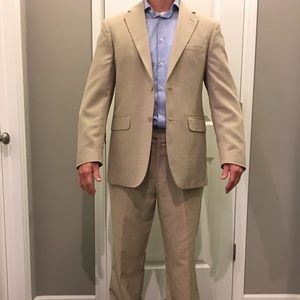 Tan men’s suit jacket and pants